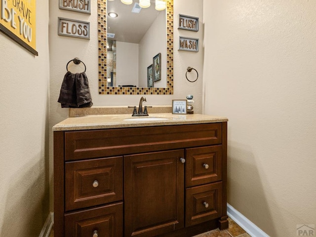 406 N Idledale Dr, Pueblo West, CO 81007 - bathroom with vanity and baseboards