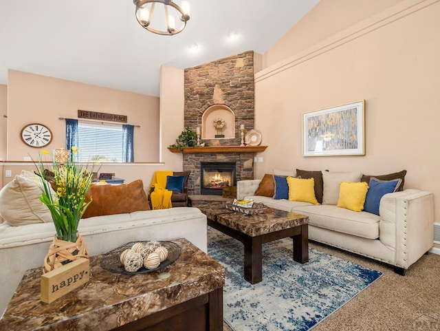 406 N Idledale Dr, Pueblo West, CO 81007 - living room featuring carpet, a fireplace, lofted ceiling, and a chandelier