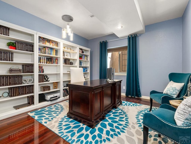 406 N Idledale Dr, Pueblo West, CO 81007 - office with dark wood-type flooring and baseboards