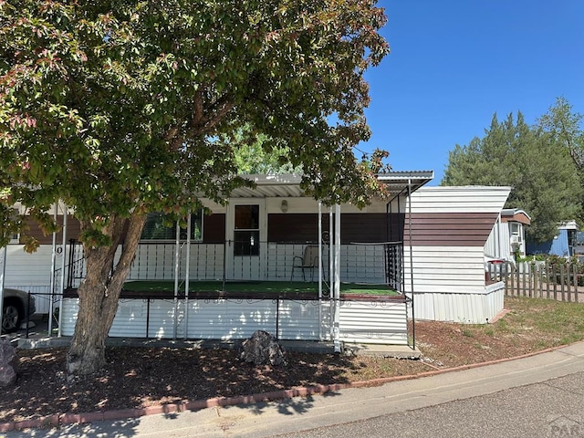 999 Fortino Blvd Unit 20, Pueblo, CO 81008 - view of front of home featuring a porch
