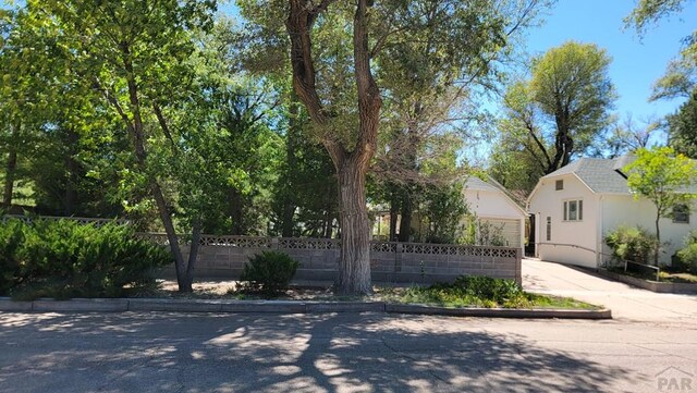 view of gate featuring fence