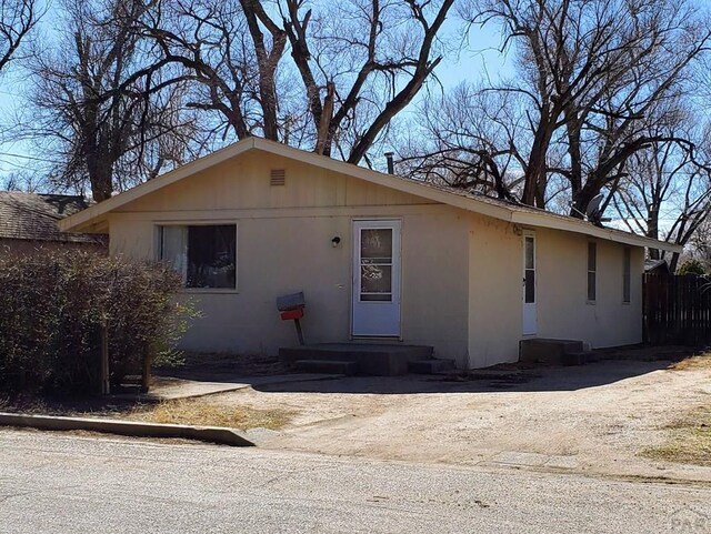 view of front of home featuring stucco siding