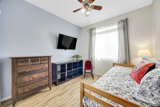 3721 Bison Ln, Pueblo, CO 81005 - bedroom with light wood-style floors and ceiling fan