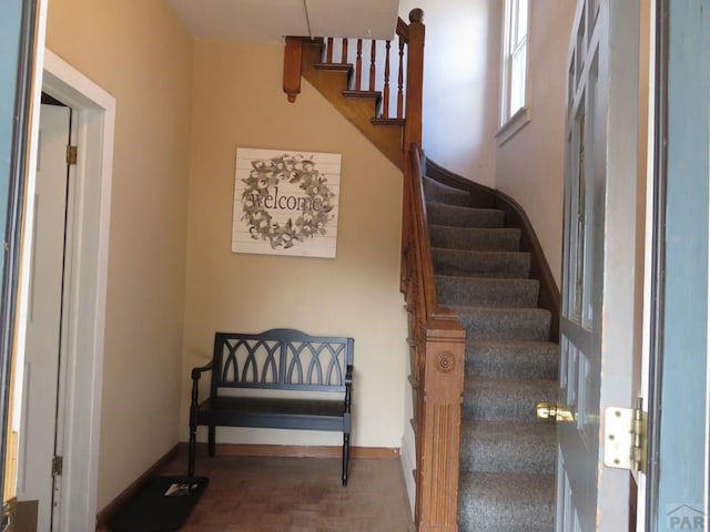 stairway with baseboards