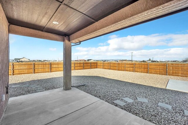 view of patio with a fenced backyard