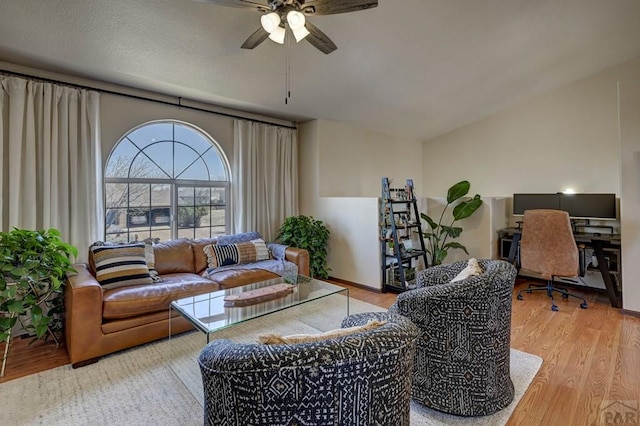 769 S Mccoy Dr, Pueblo West, CO 81007 - living room with lofted ceiling, wood finished floors, and ceiling fan