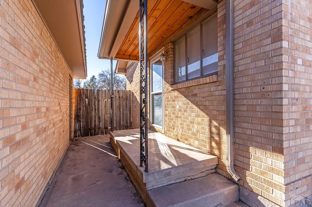 view of patio / terrace featuring fence