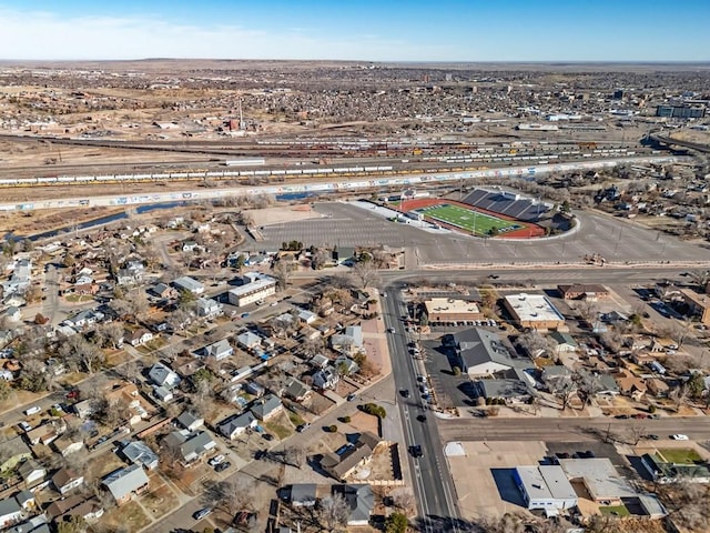 birds eye view of property with a residential view