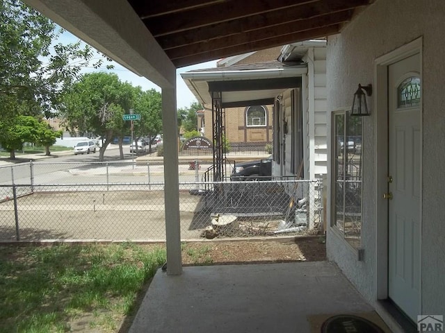 1802 Pine St, Pueblo, CO 81004 - exterior space with stucco siding and fence