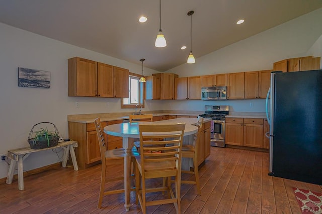 1771 Sunrise Rd, Walsenburg, CO 81089 - kitchen featuring stainless steel appliances, lofted ceiling, dark wood-style floors, and light countertops