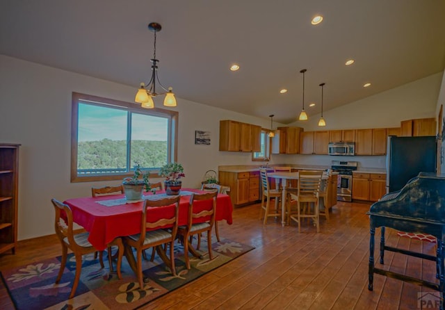 1771 Sunrise Rd, Walsenburg, CO 81089 - dining room with vaulted ceiling, recessed lighting, and wood finished floors