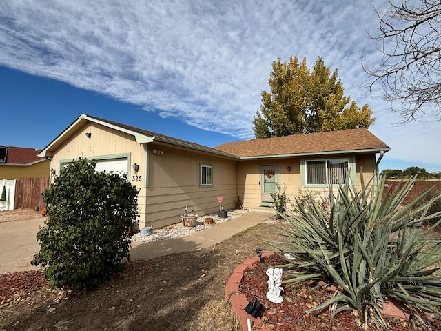 single story home with a garage