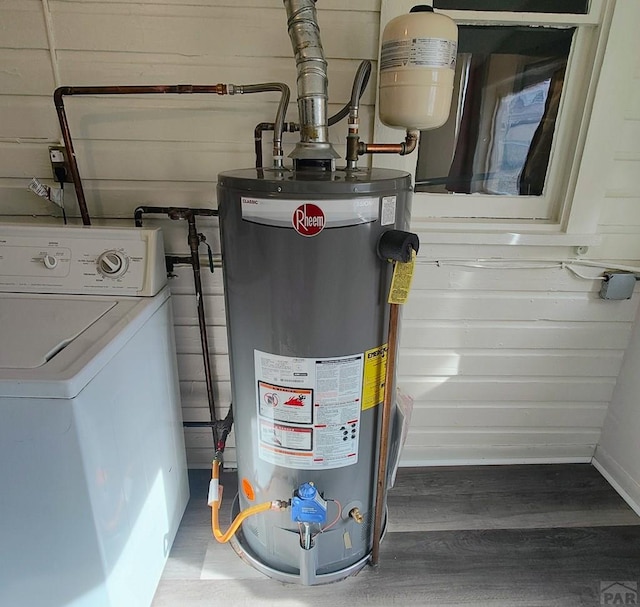 utility room featuring washer / clothes dryer and gas water heater