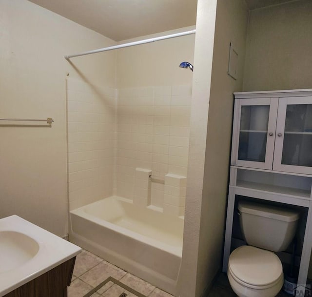 bathroom featuring  shower combination, tile patterned flooring, vanity, and toilet