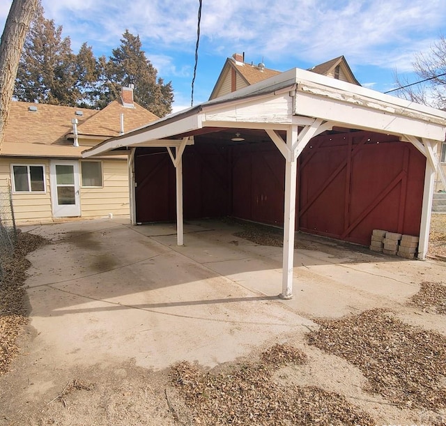 exterior space with a detached carport