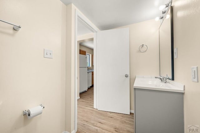 320 E Godding, Trinidad, CO 81082 - bathroom with vanity and wood finished floors