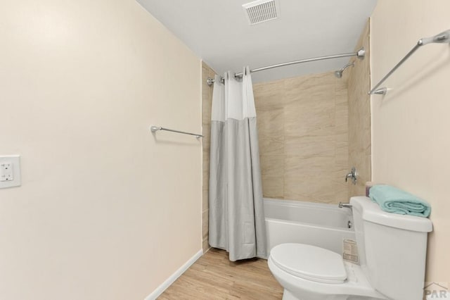 320 E Godding, Trinidad, CO 81082 - bathroom with shower / tub combo and wood finished floors