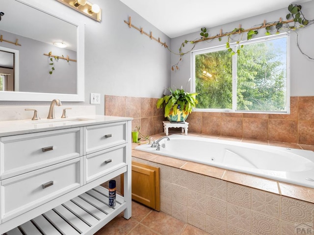 2910 8th Ave, Pueblo, CO 81008 - bathroom with vanity, a tub with jets, and tile patterned floors