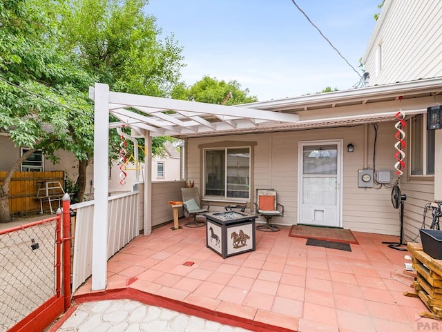 2910 8th Ave, Pueblo, CO 81008 - view of patio / terrace with an outdoor fire pit and a pergola