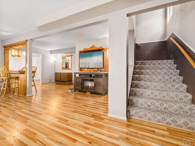 2910 8th Ave, Pueblo, CO 81008 - stairway featuring wood finished floors and baseboards