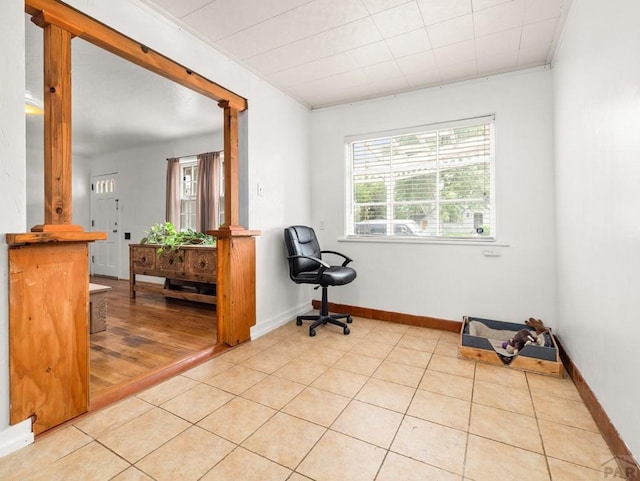 2910 8th Ave, Pueblo, CO 81008 - sitting room featuring light tile patterned flooring and crown molding