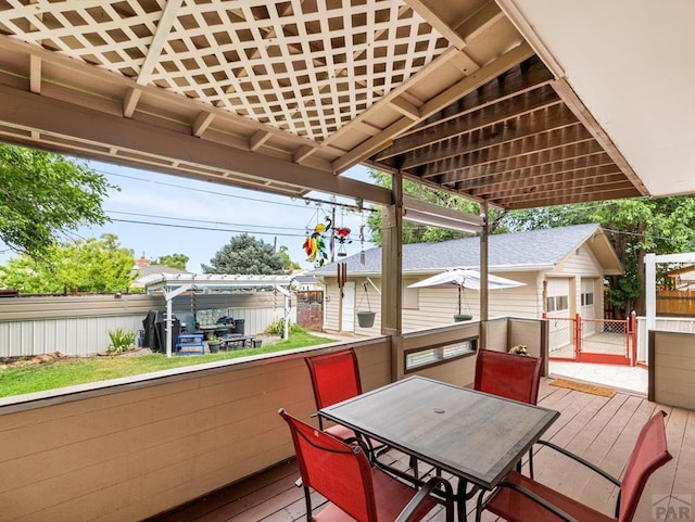 2910 8th Ave, Pueblo, CO 81008 - deck featuring an outbuilding and outdoor dining area