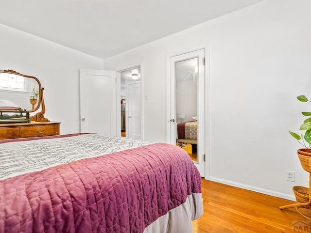 2910 8th Ave, Pueblo, CO 81008 - bedroom with light wood finished floors and baseboards