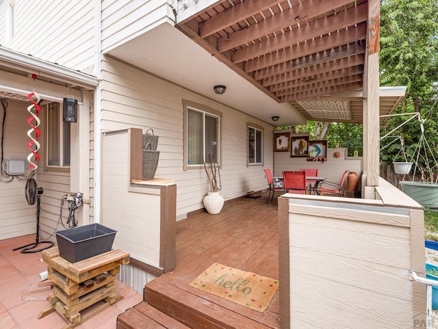 2910 8th Ave, Pueblo, CO 81008 - wooden deck featuring outdoor dining area