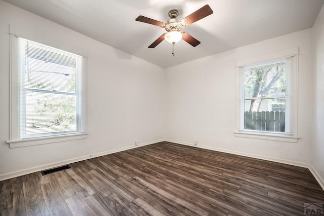 2325 W St, Pueblo, CO 81003 - unfurnished room with dark wood-style flooring and a ceiling fan