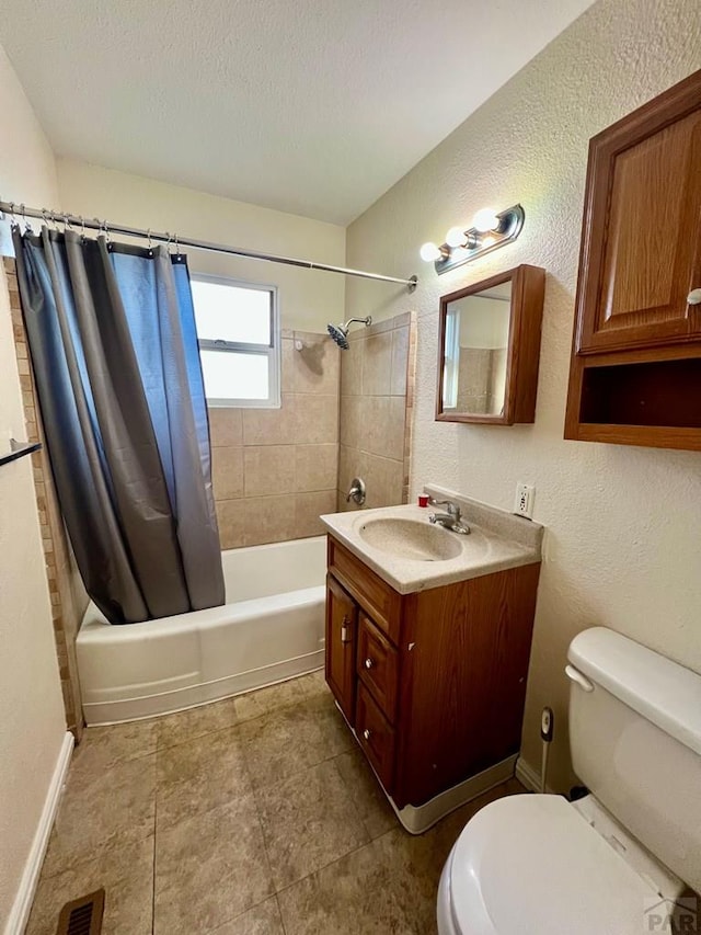 bathroom with visible vents, toilet, shower / tub combo, a textured ceiling, and vanity