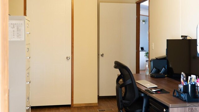 office with dark wood-style floors