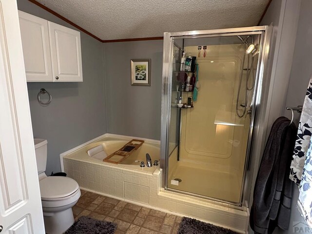 full bathroom with a textured ceiling, toilet, stone finish flooring, a stall shower, and crown molding