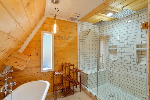 bathroom with wooden ceiling, wood walls, a shower stall, a freestanding tub, and tile patterned floors