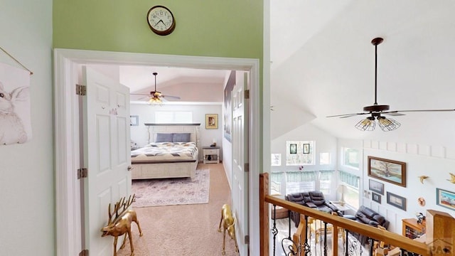 356 S Littler Dr, Pueblo West, CO 81007 - corridor with vaulted ceiling and carpet floors