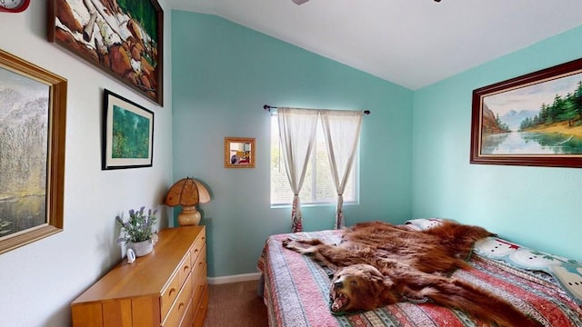356 S Littler Dr, Pueblo West, CO 81007 - bedroom with vaulted ceiling, carpet flooring, and baseboards