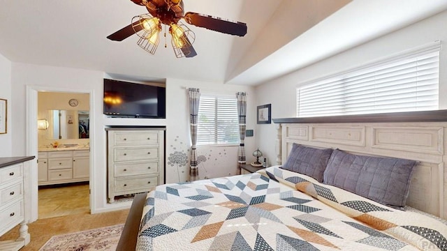 356 S Littler Dr, Pueblo West, CO 81007 - bedroom featuring connected bathroom, vaulted ceiling, and ceiling fan