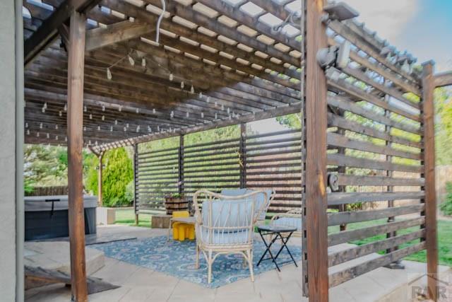356 S Littler Dr, Pueblo West, CO 81007 - view of patio / terrace featuring a pergola