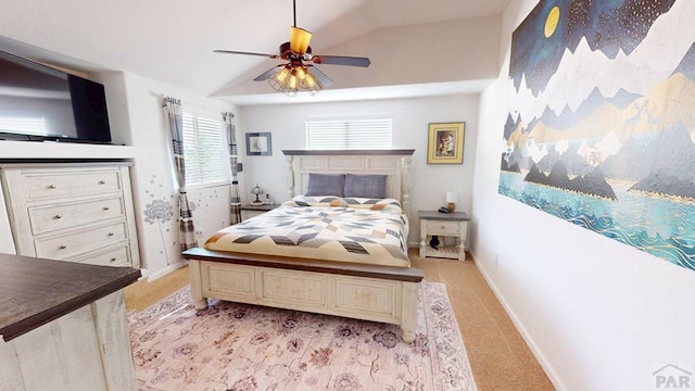 356 S Littler Dr, Pueblo West, CO 81007 - bedroom with baseboards, ceiling fan, lofted ceiling, and light carpet