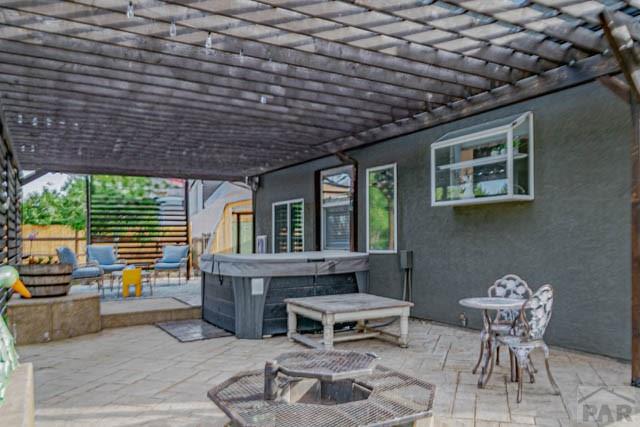 356 S Littler Dr, Pueblo West, CO 81007 - view of patio / terrace with a hot tub and a pergola