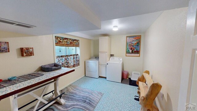 356 S Littler Dr, Pueblo West, CO 81007 - laundry room with washing machine and dryer, baseboards, and cabinet space