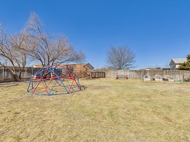 view of yard with a fenced backyard