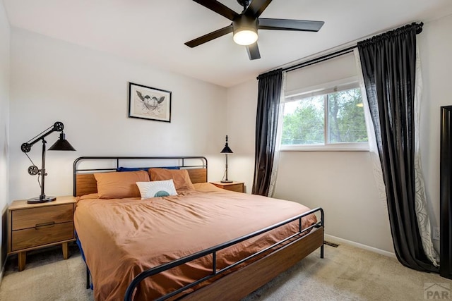 20 N 32nd St, Colorado Springs, CO 80904 - bedroom with light colored carpet, baseboards, and a ceiling fan