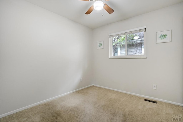 20 N 32nd St, Colorado Springs, CO 80904 - spare room featuring carpet, baseboards, and a ceiling fan