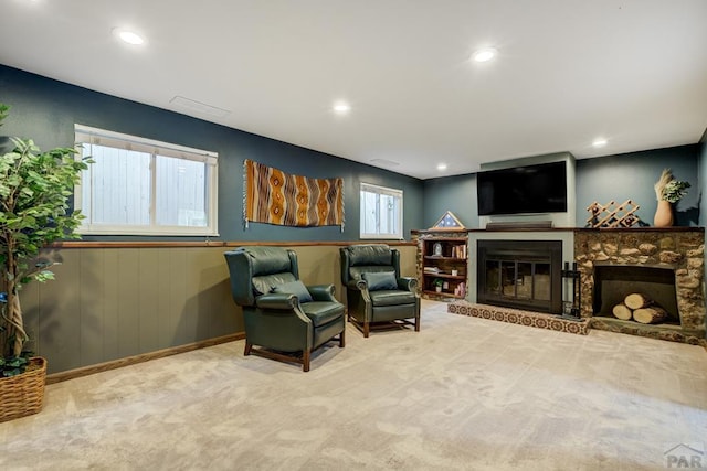 20 N 32nd St, Colorado Springs, CO 80904 - living area with recessed lighting, a glass covered fireplace, carpet floors, and wainscoting