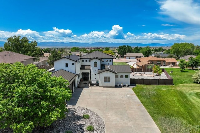 489 S Pin High Dr, Pueblo West, CO 81007 - aerial perspective of suburban area featuring mountains