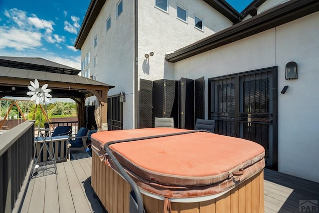 489 S Pin High Dr, Pueblo West, CO 81007 - wooden terrace featuring a hot tub and a gazebo