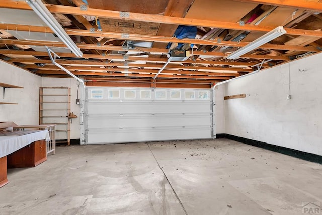 2121 N Greenwood St, Pueblo, CO 81003 - garage featuring a garage door opener
