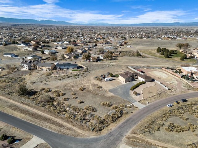 aerial view with a residential view and a mountain view