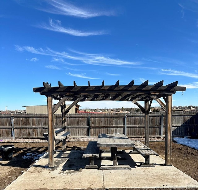 view of patio / terrace featuring fence and a pergola