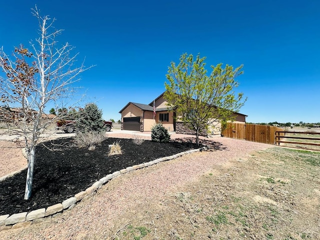 822 S Espanola Dr, Pueblo West, CO 81007 - exterior space with a garage and fence